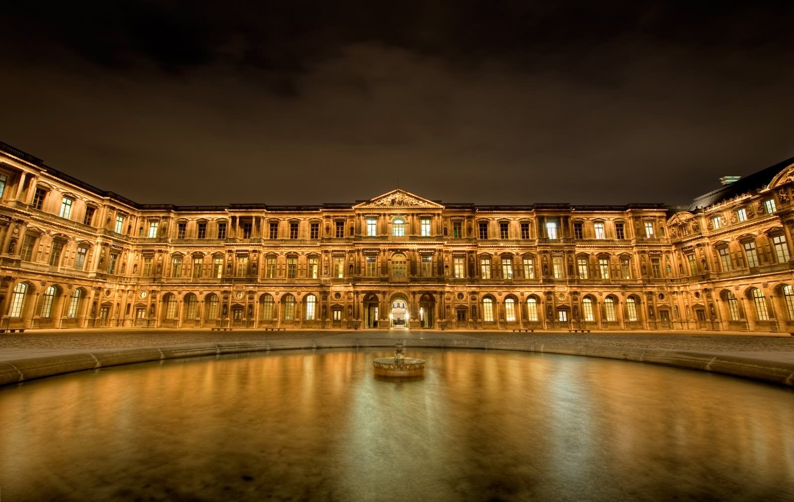 Front View Of Louvre Museum At Night