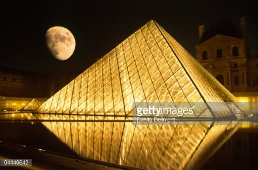 Glass Pyramid Outside Louvre Museum At Night