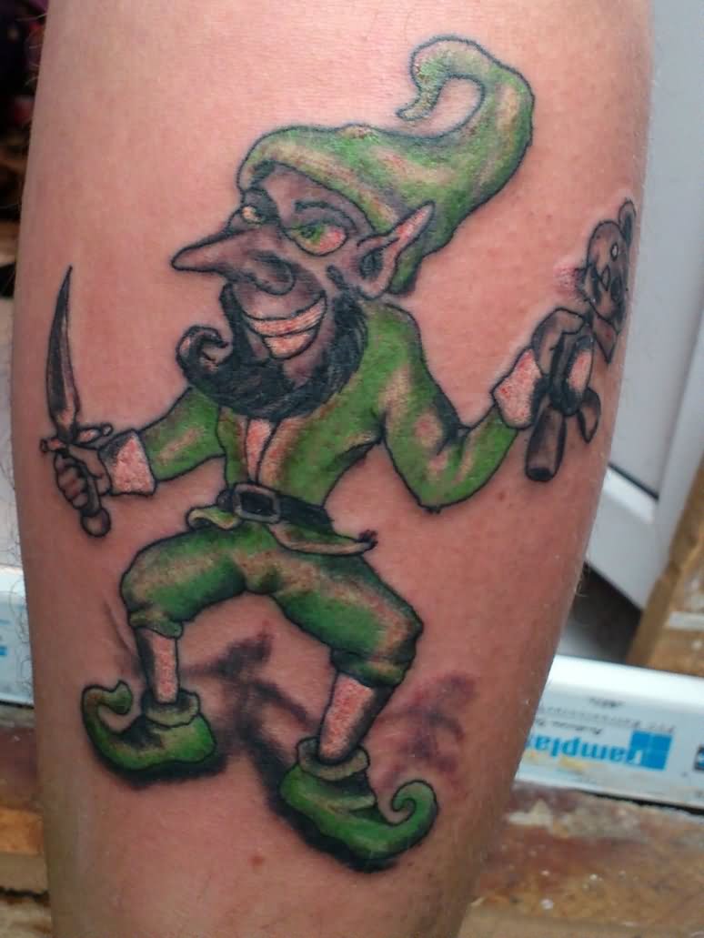 Green Ink Leprechaun Tattoo On Back Leg