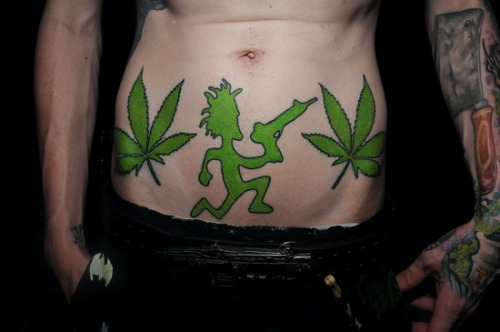 Green Marijuana Leaves And Juggalo Tattoo On Belly