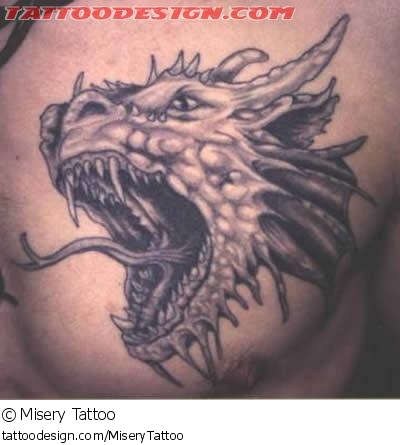 Grey Fantasy Dragon Head Tattoo On Chest by Misery