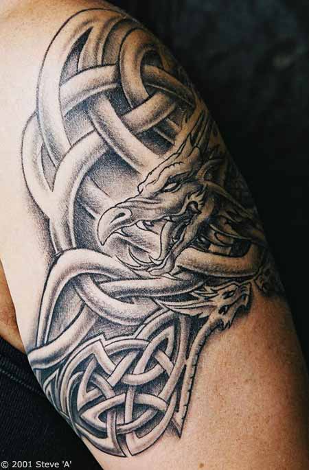 Grey Ink Celtic Fantasy Dragon Tattoo On Bicep