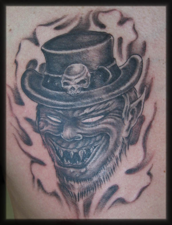 Grey Ink Evil Leprechaun Tattoo