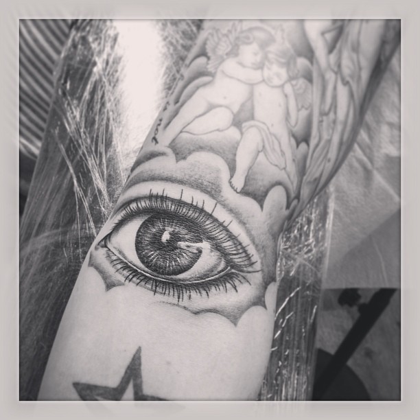 Grey Ink Eye Tattoo On Inside Elbow