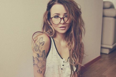 Grey Ink Floral Tattoo On Girl Right Arm