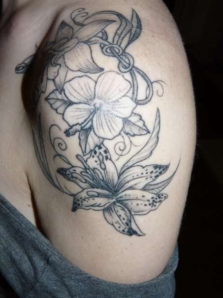 Grey Ink Floral Tattoo On Left Shoulder