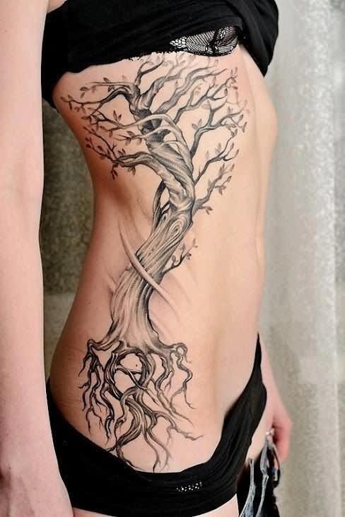 Grey Ink Halloween Tree Tattoo On Girl Side Rib