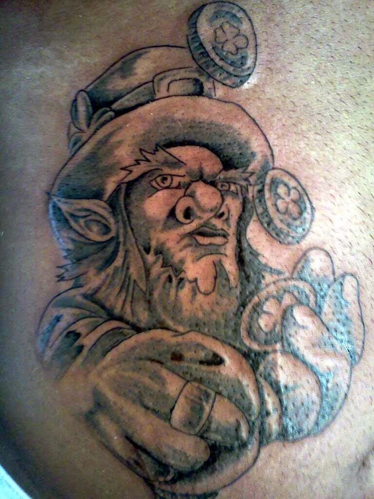 Grey Ink Leprechaun Tattoo On Back