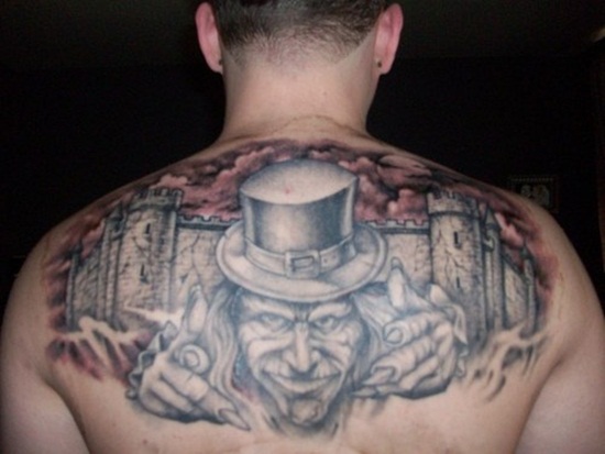 Grey Ink Leprechaun Tattoo On Man Upper Back