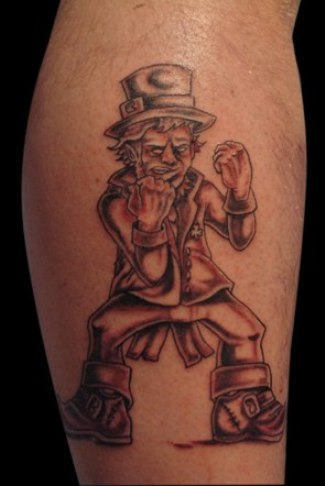 Grey Ink Leprechaun Tattoos On Leg