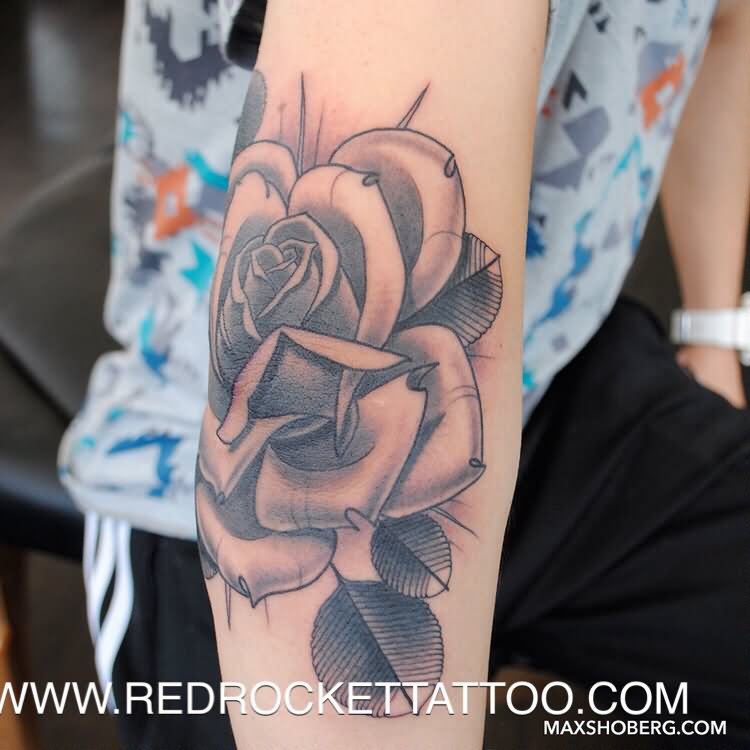 Grey Ink Rose Tattoo On Right Elbow