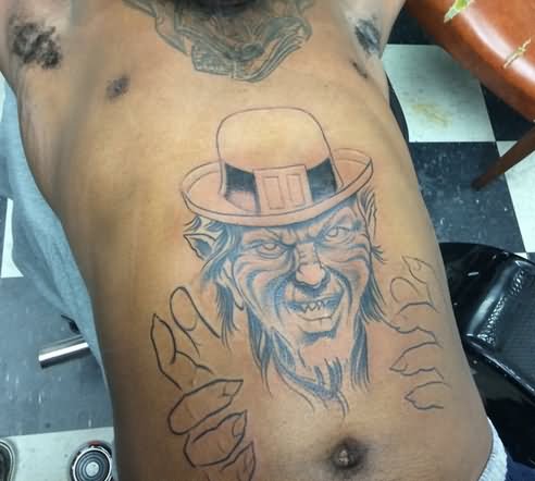 Grey Outline Leprechaun Tattoo On Man Body
