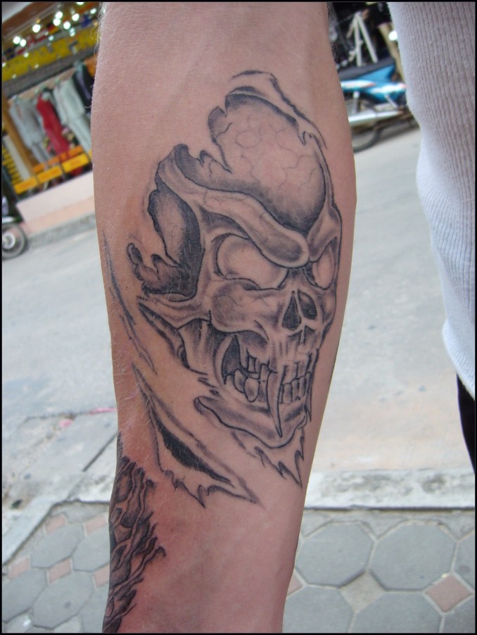Grey Skull Fantasy Tattoo On Arm Sleeve