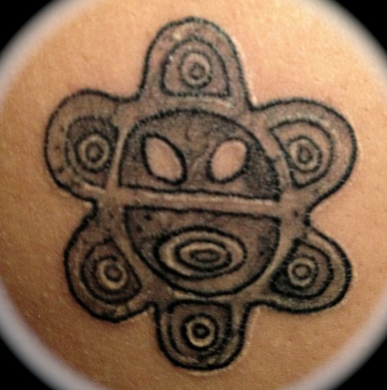 Grey Taino Sun Symbol Tattoo
