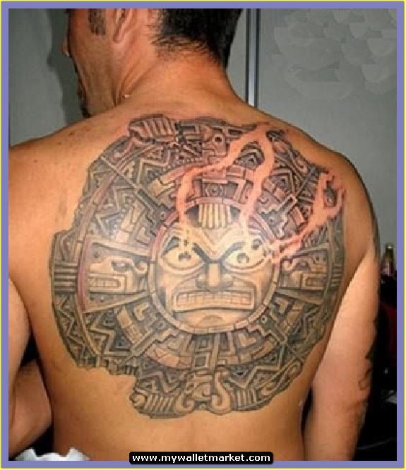 Grey Taino Sun Tattoo On Man Back