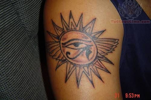 Grey Taino Sun Tattoo On Right Bicep