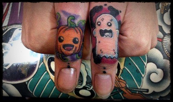 Halloween Pumpkin And Ghost Tattoo On Both Thumb