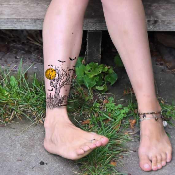 Halloween Tree With Moon Tattoo On Leg