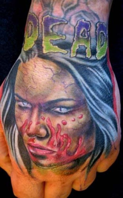 Halloween Zombie Face Tattoo On Hand