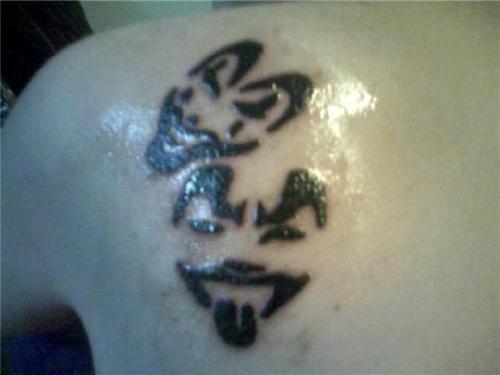 Juggalo Tattoo On Left Back Shoulder