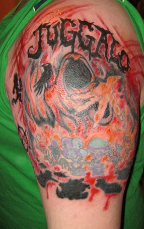 Juggalo Tattoo On Man Left Half Sleeve