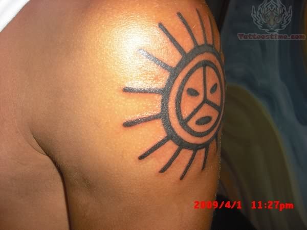 Left Shoulder Peace Symbol Taino Sun Tattoo For Men