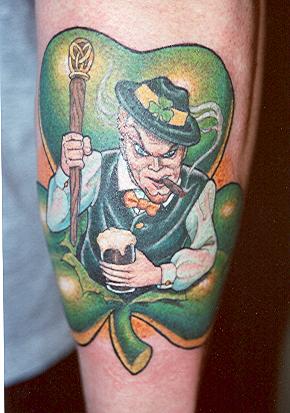 Leprechaun In Clover Leaf Tattoo On Arm