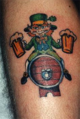 Leprechaun With Beer Mugs Tattoo On Leg