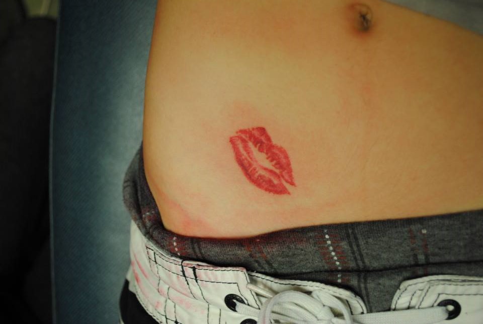 Lipstick Kiss Mark Tattoo On Hip