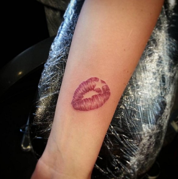 Lipstick Print Tattoo On Forearm