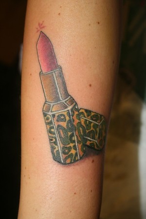 Lipstick Tattoo On Arm Sleeve