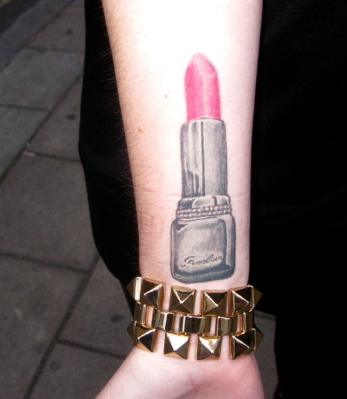 Lipstick Tattoo On Right Forearm
