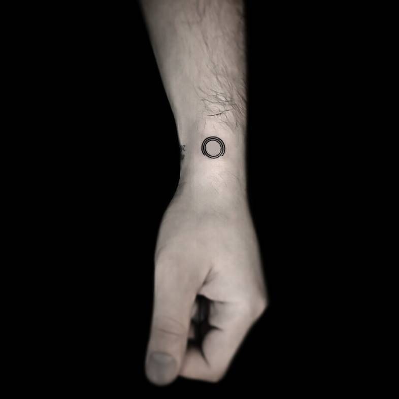 Little Circle Tattoo On Side Wrist