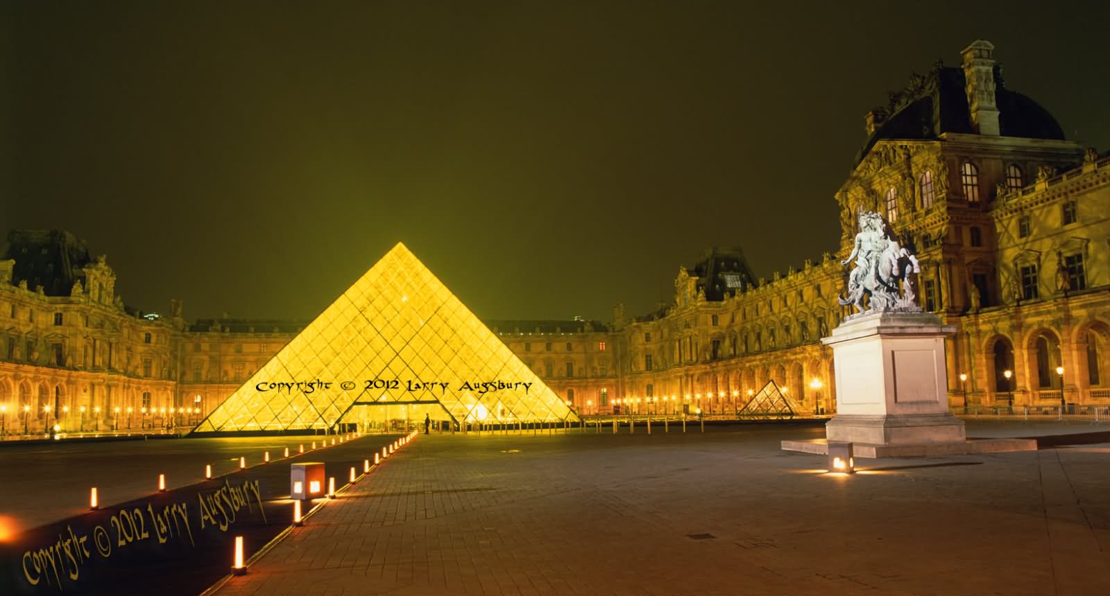 Louvre Museum In Paris At Night