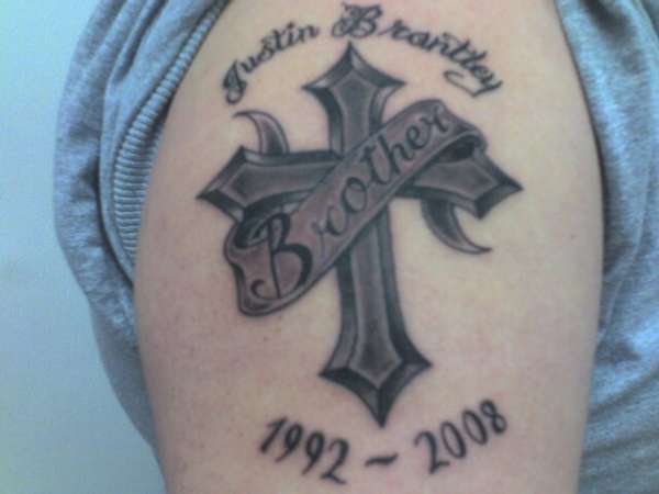 Memorial Black Ink Cross With Banner Tattoo On Right Shoulder