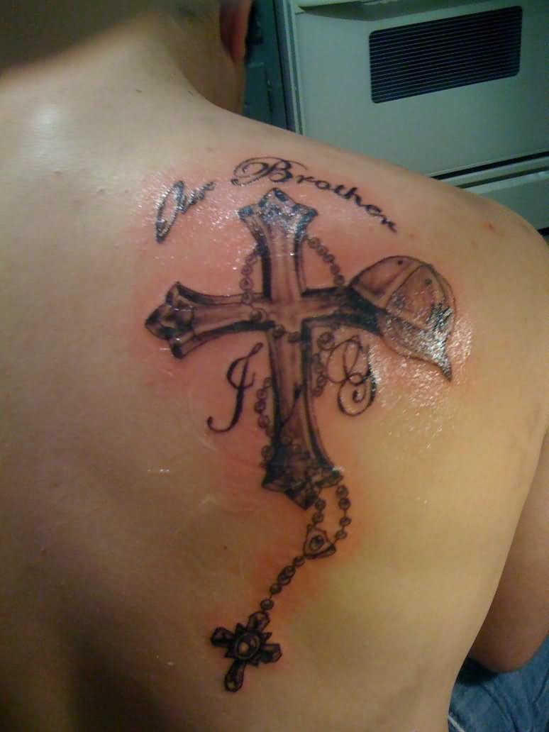 Memorial Black Ink Cross With Rosary Cross Tattoo On Man Right Back Shoulder