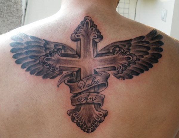 Memorial Black Ink Cross With Wings And Banner Tattoo On Upper Back