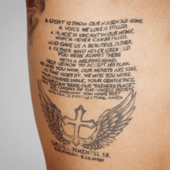 Memorial Black Ink Cross With Wings Tattoo Design