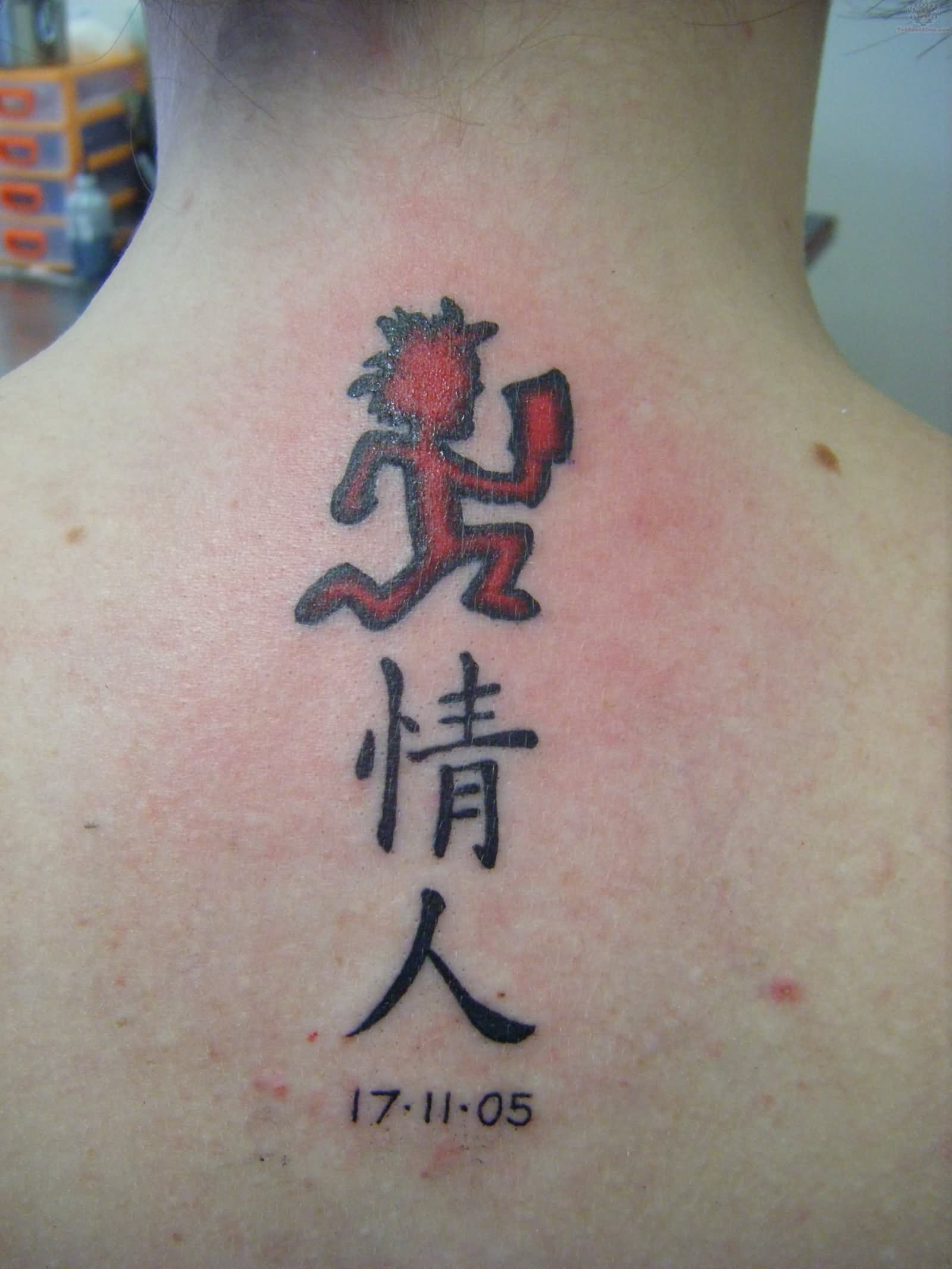 Memorial Chinese Symbol And Juggalo Tattoo On Upper Back