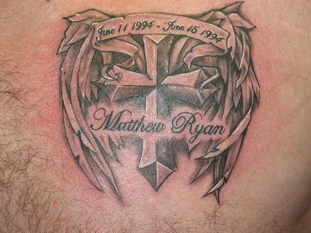 Memorial Cross With Angel Wings And Banner Tattoo Design