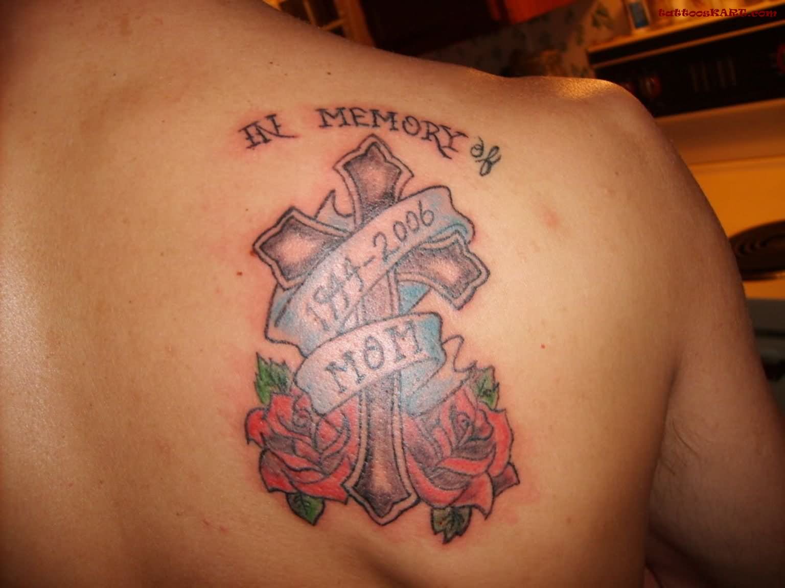 Memorial Cross With Banner And Roses Tattoo On Right Back Shoulder