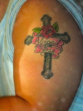 Memorial Cross With Rose And Banner Tattoo For Brother