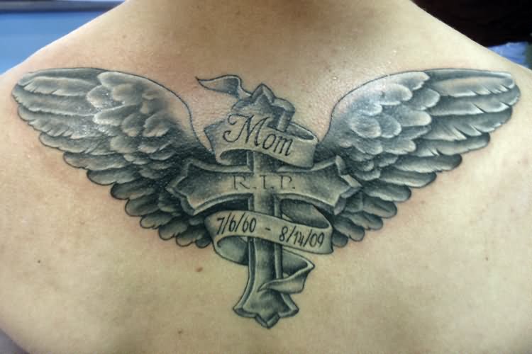 Memorial Cross With Wings And Banner Tattoo On Upper Back