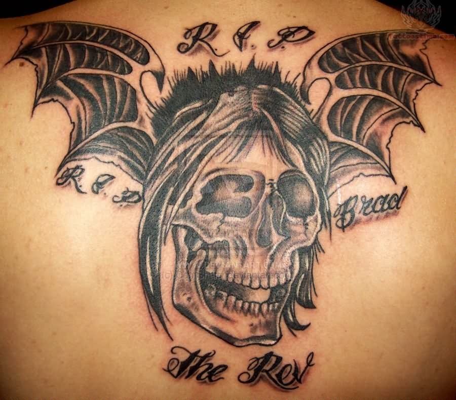 Memorial Skull With Bat Wings Tattoo Design