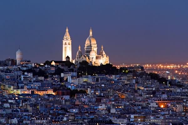 Night View Of Sacre Coeur Over The City