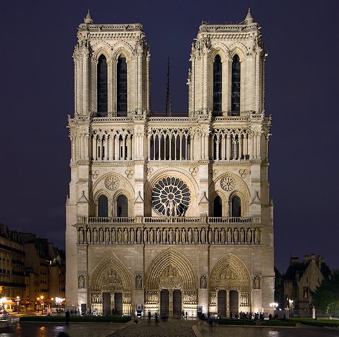 Notre Dame de Paris Facade Illuminated At Light