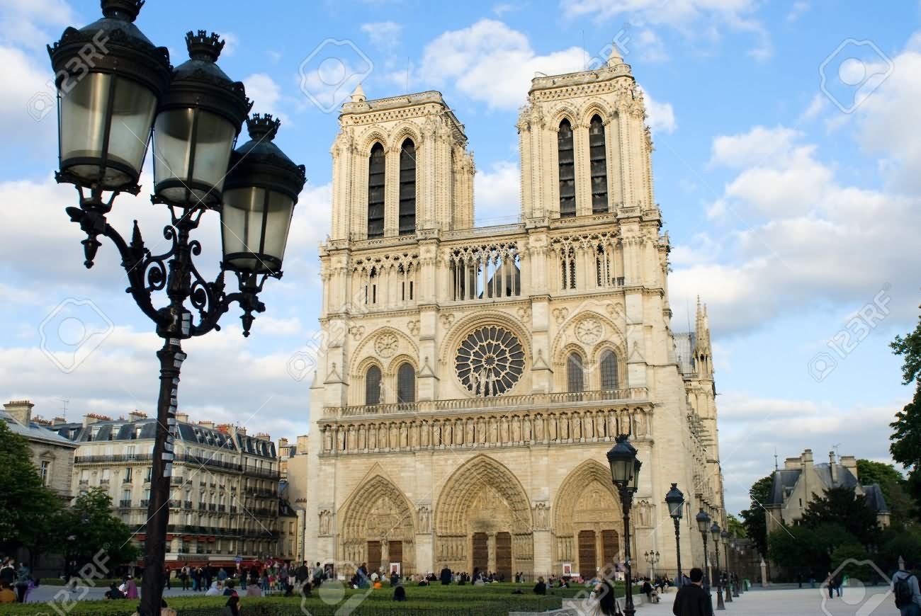Notre Dame de Paris Front View With Street Lamps