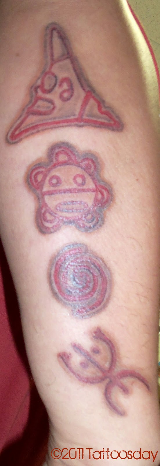 Paul Symbols Red Ink Taino Sun Tattoo
