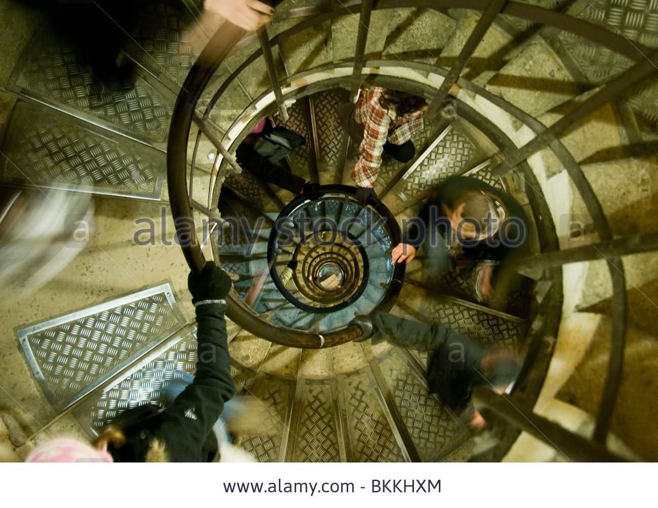 People Climbing The 294 Steps Up The Spiral Staircase Inside The Arc de Triomphe