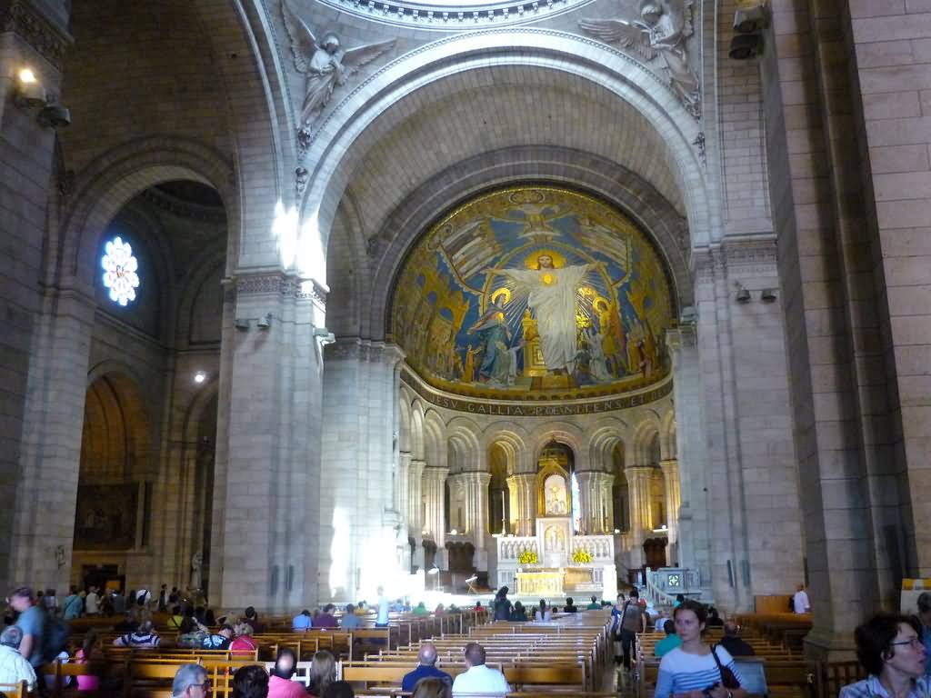People Taking Part In Mass Prayer At Sacre-Coeur Inside Picture